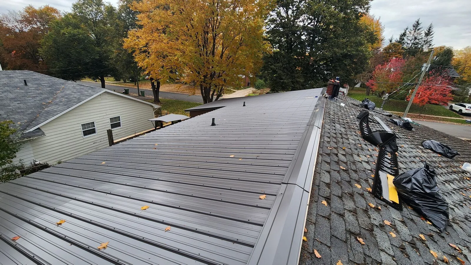 Metal roof over the old shingles — finished