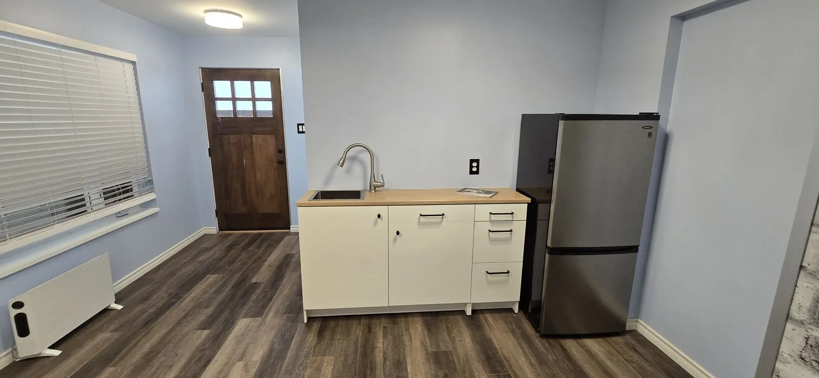 Home addition: studio suite with shower room — finished (6)