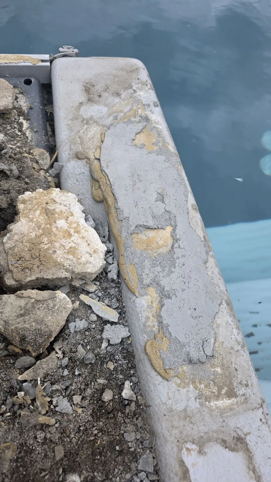 Pool coping and paver repair — before