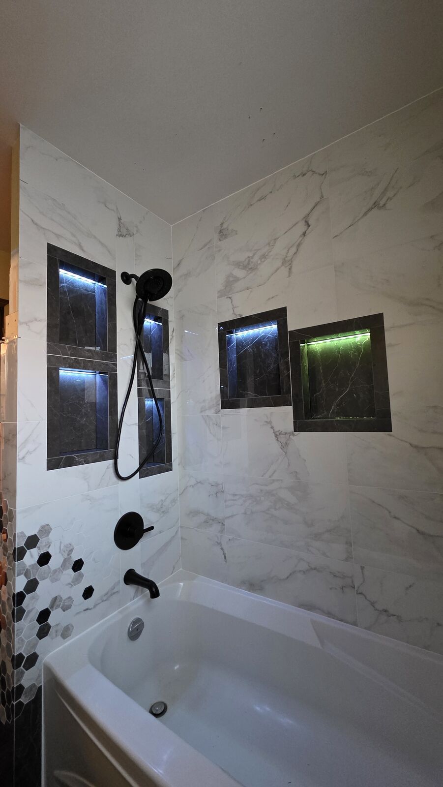 Bathroom remodel: tub surround, niches and hex accent