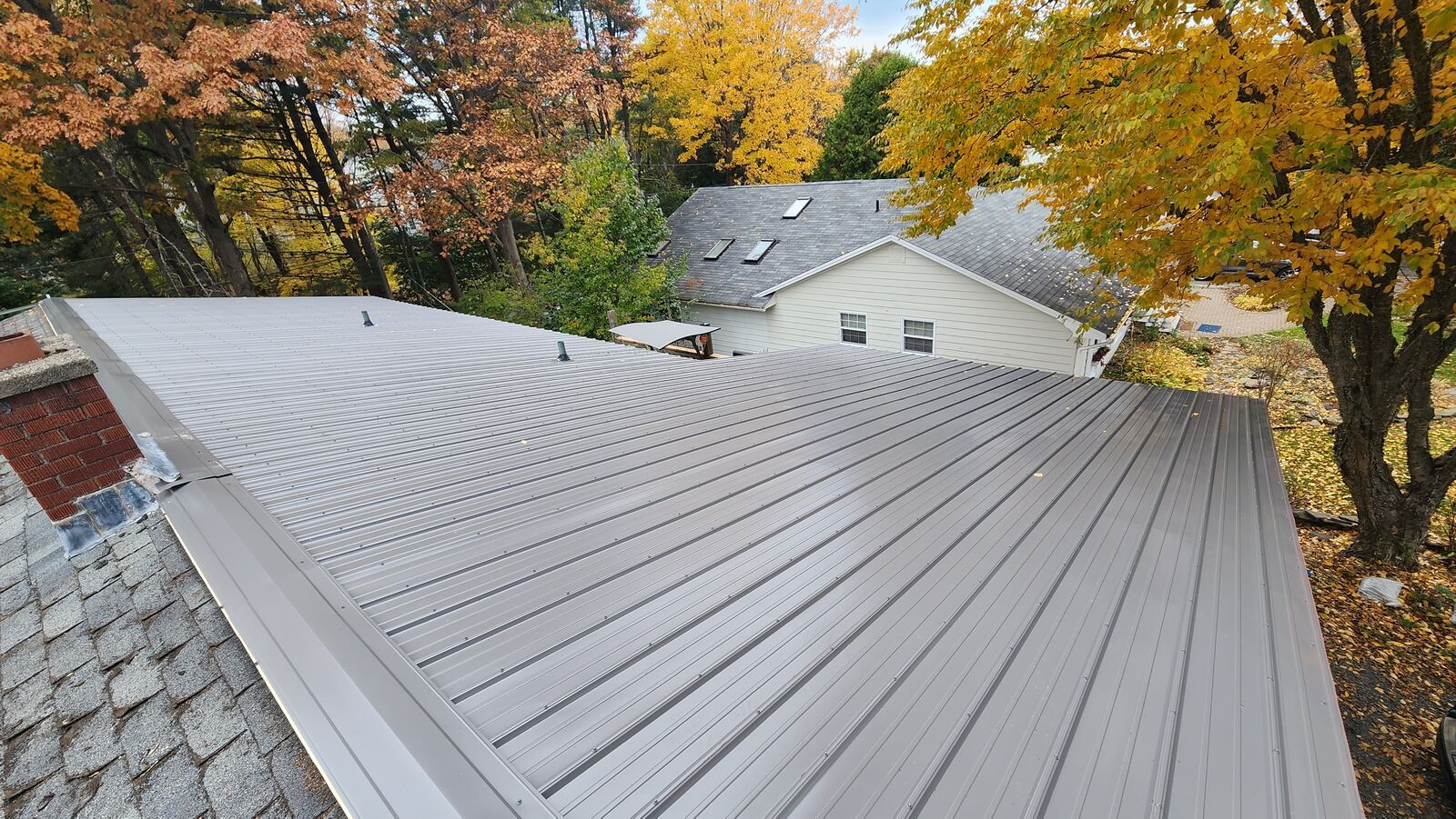 Metal roof over the old shingles