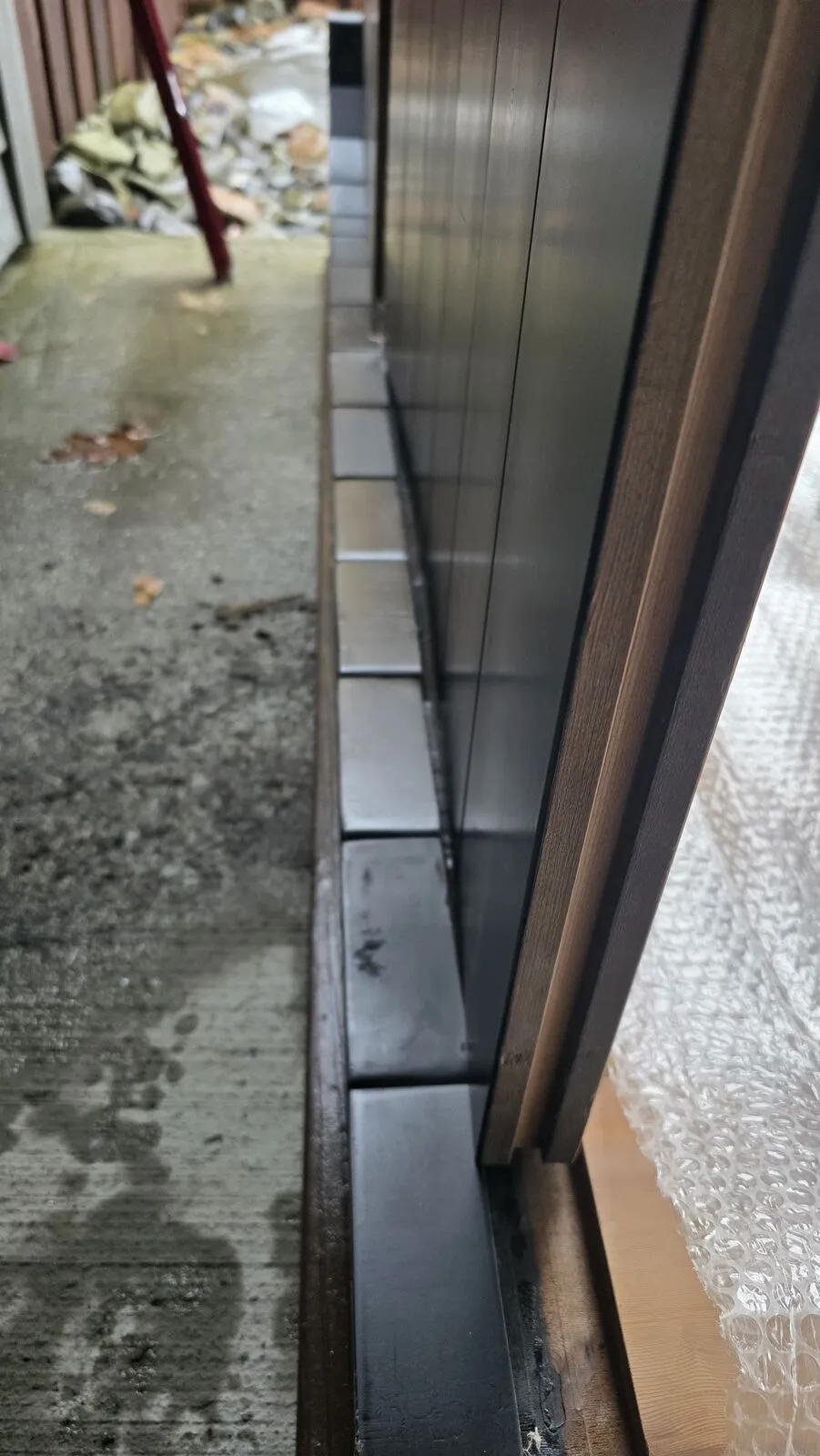 Backyard sauna under the covered patio — work in progress