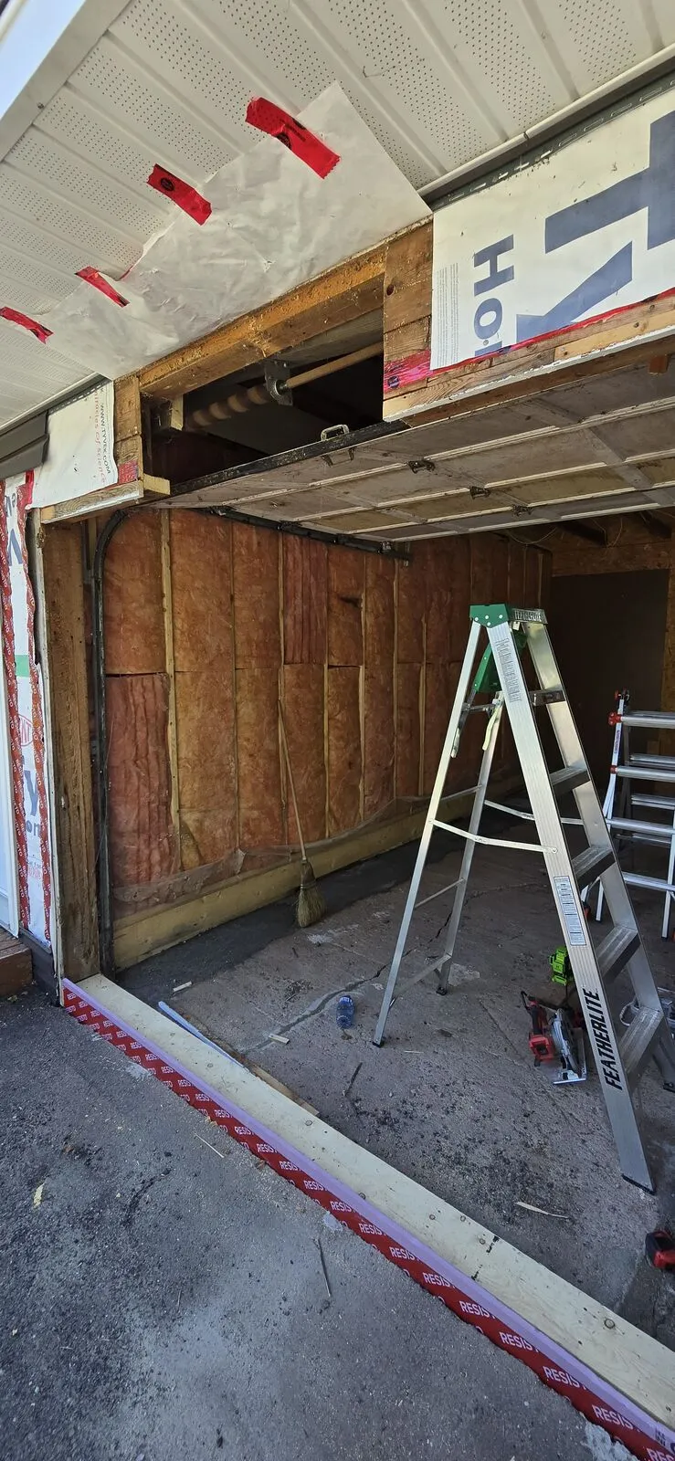 Garage converted to a living space, with new siding — work in progress (4)