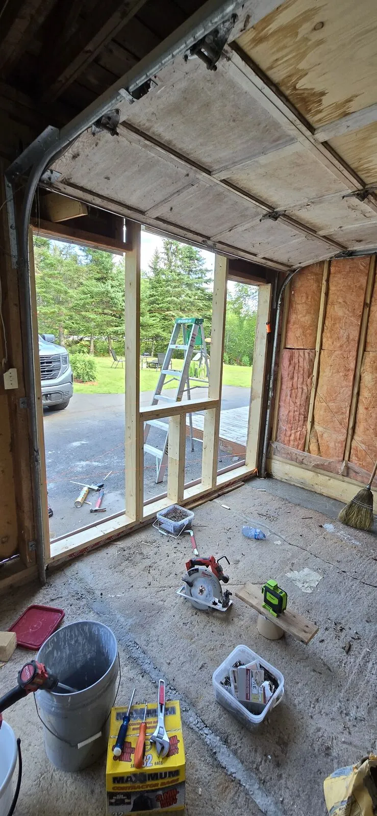 Garage converted to a living space, with new siding — work in progress (5)