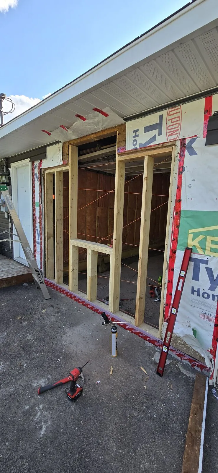 Garage converted to a living space, with new siding — work in progress (7)