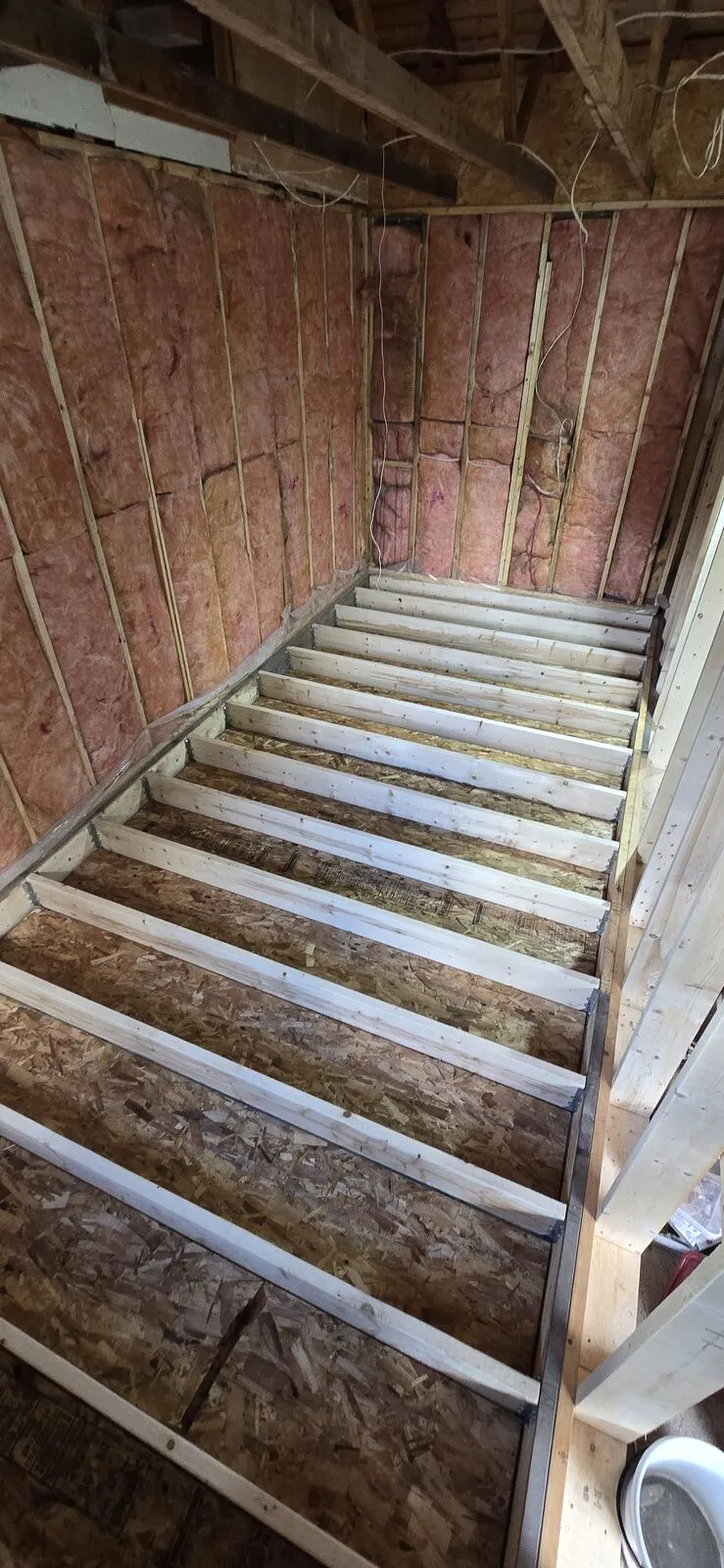 Garage converted to a living space, with new siding — work in progress (11)