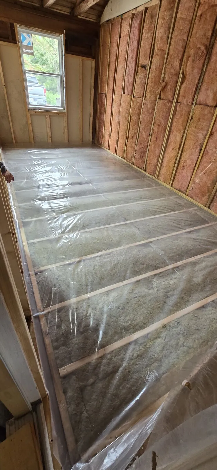 Garage converted to a living space, with new siding — work in progress (12)