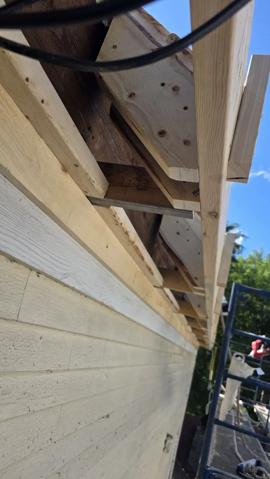 Roof replacement and skylight removal — work in progress (19)